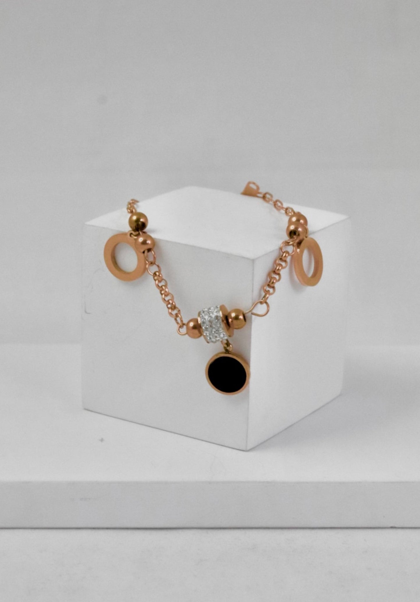 P-Nisa Premium Rose-Gold Polish Delicate Round Design With Diamond And Ceramic Studded Bracelet For Women and Girls