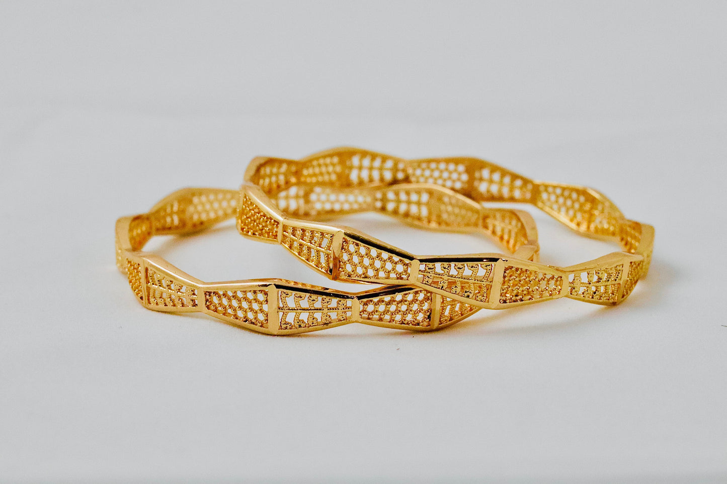 P-Nisa High Gold Polish Charming Geometrical Waves Design Bangles For Women and Girls