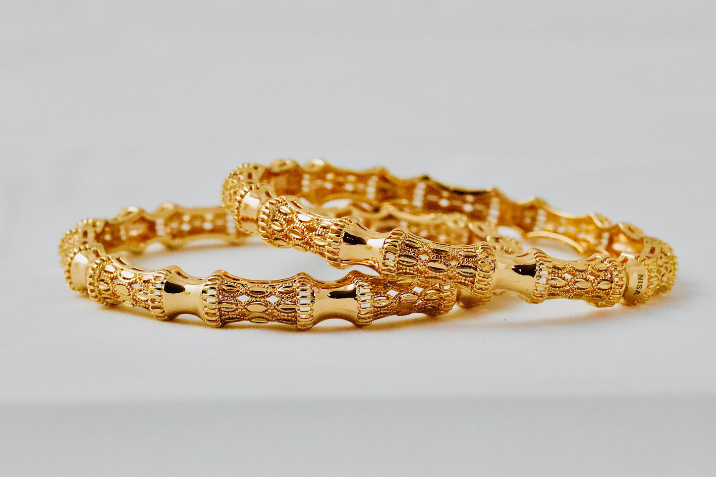 P-Nisa High Gold Polish Deep Curves Design Bangles For Women and Girls