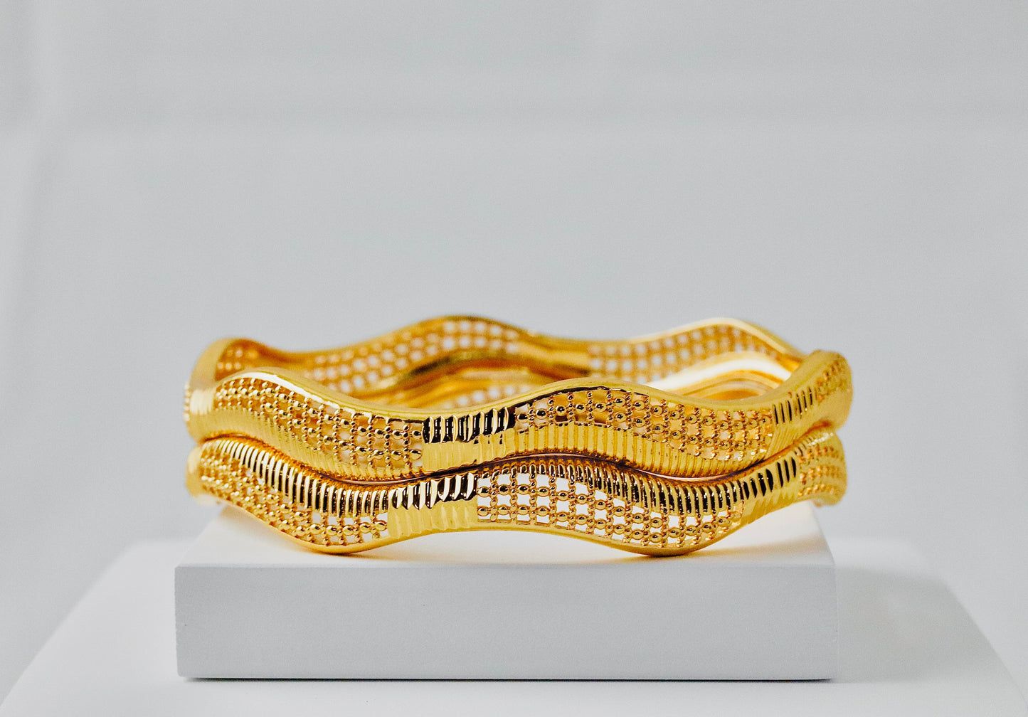 P-Nisa High Gold Polish Waves Shape Design Bangles For Women and Girls