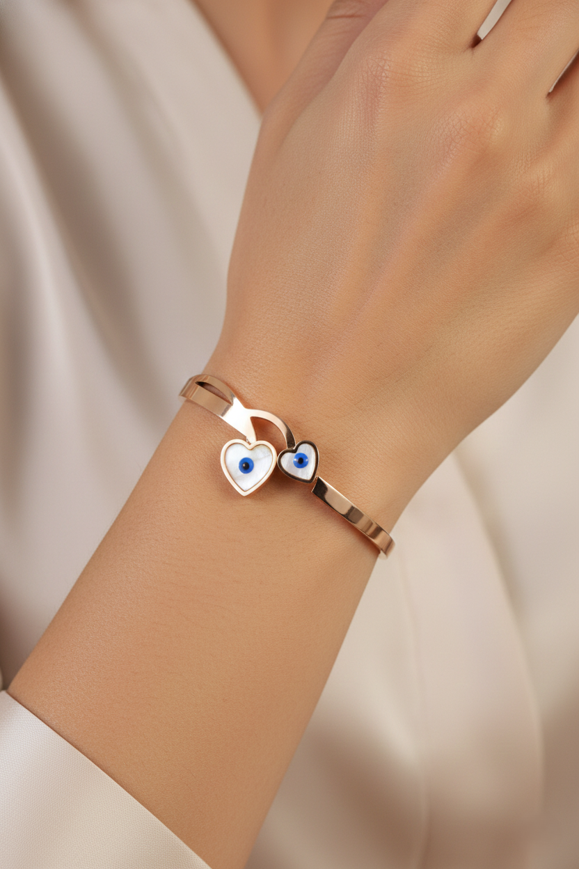 Nisa Premium Rose-Gold Polish Evil-Eyes Design With Heart Shape White Pearl Studded Bracelet For Women and Girls