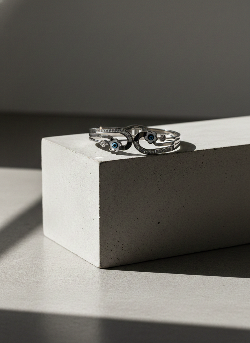 Nisa Premium Silver-Polish Evil-Eyes In Flower Design With Diamond And Pearl Studded Bracelet For Women and Girls