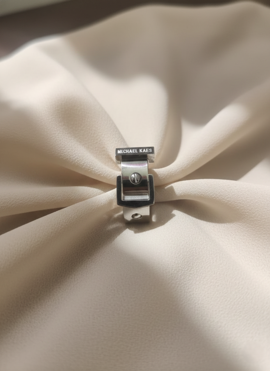 Stainless Steel Buckle Ring by MICHAEL KAES