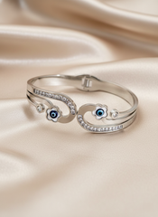Nisa Premium Silver-Polish Evil-Eyes In Flower Design With Diamond And Pearl Studded Bracelet For Women and Girls