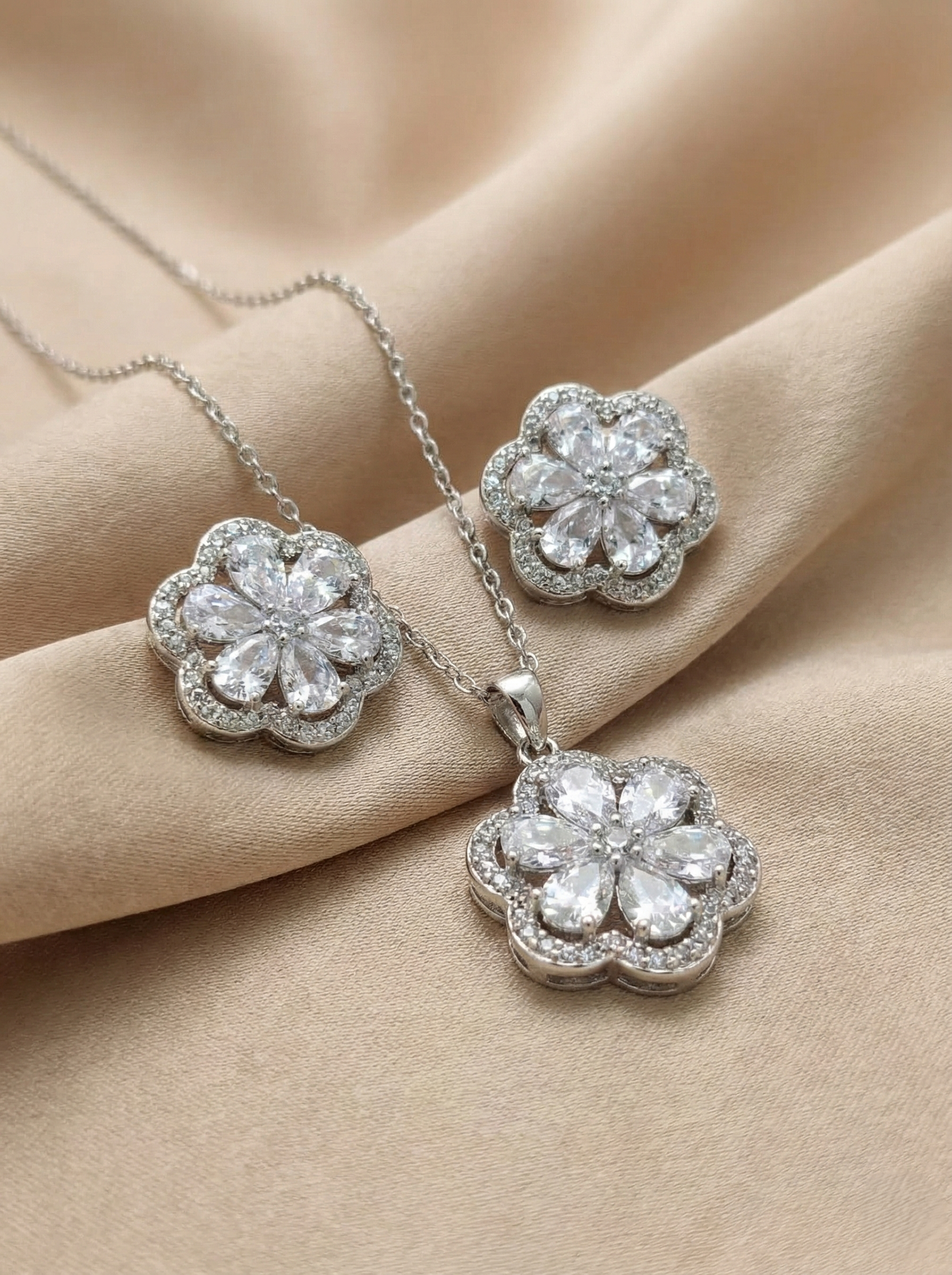 Silver-Toned Floral American Diamond (AD) Pendant Set with Matching Earrings