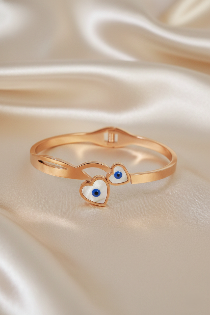 Nisa Premium Rose-Gold Polish Evil-Eyes Design With Heart Shape White Pearl Studded Bracelet For Women and Girls