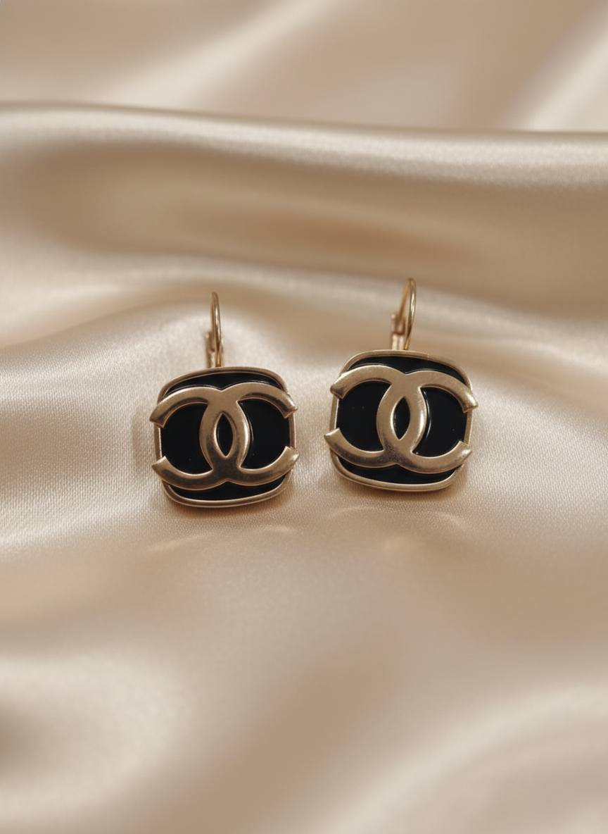 Stainless Steel Rose Gold Tone Interlock Earrings