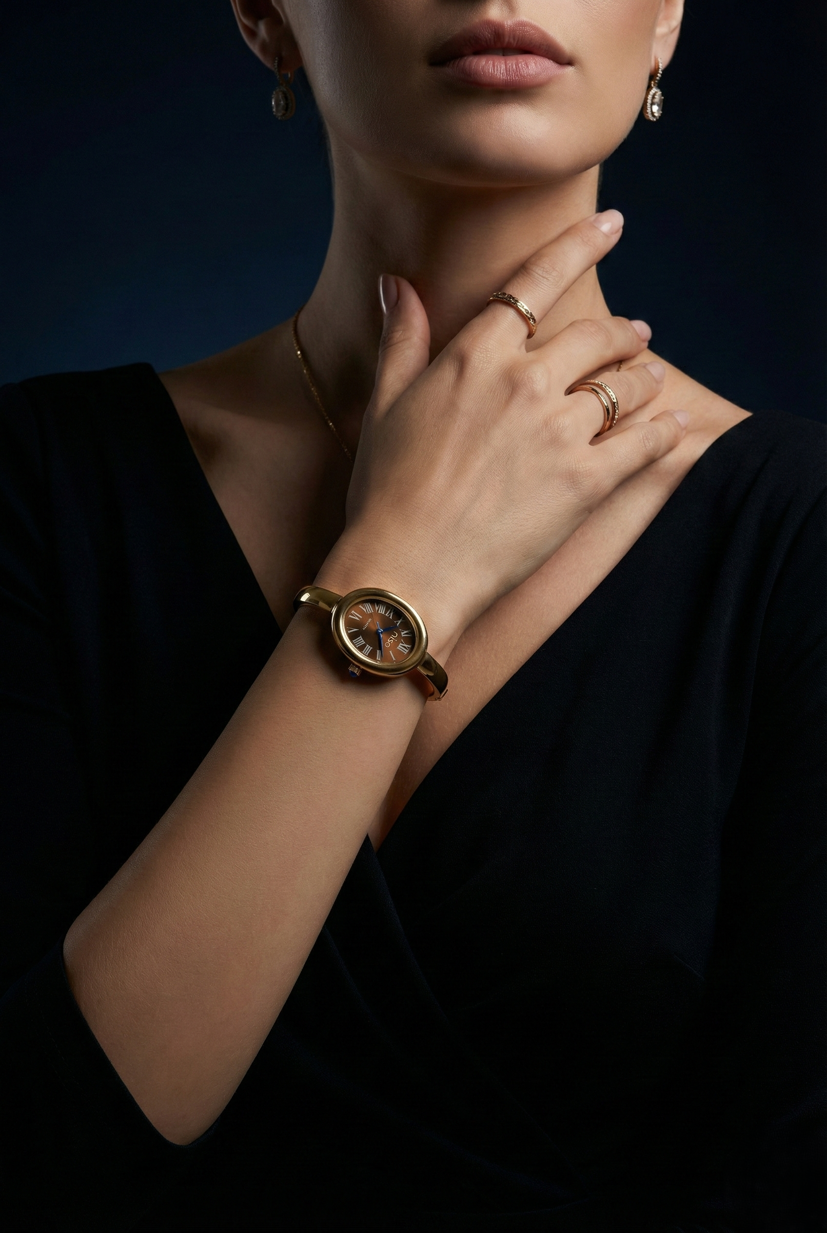 Nisa Ellipse Gold Bangle Watch