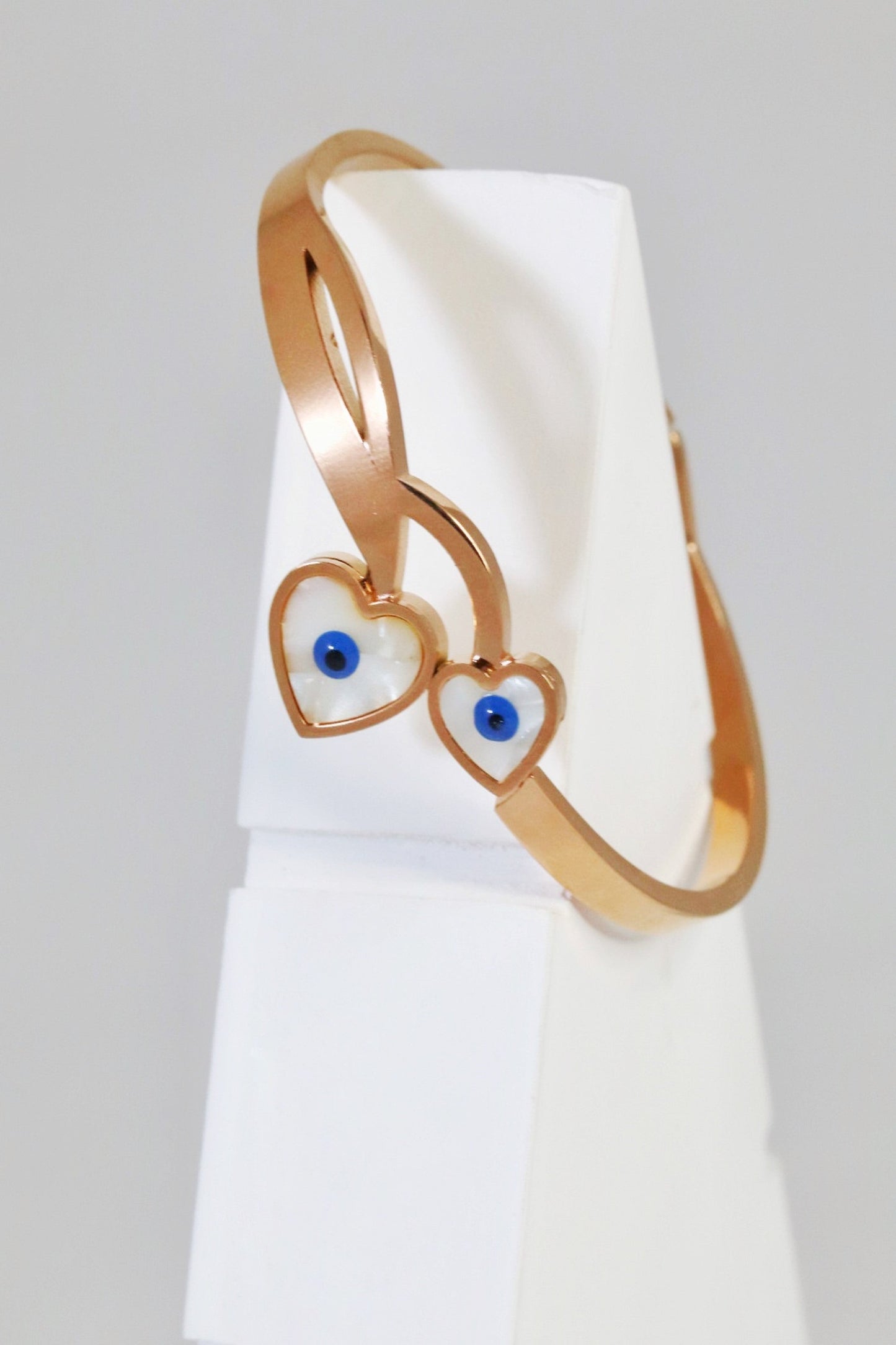 P-Nisa Premium Rose-Gold Polish Evil-Eyes Design With Heart Shape White Pearl Studded Bracelet For Women and Girls