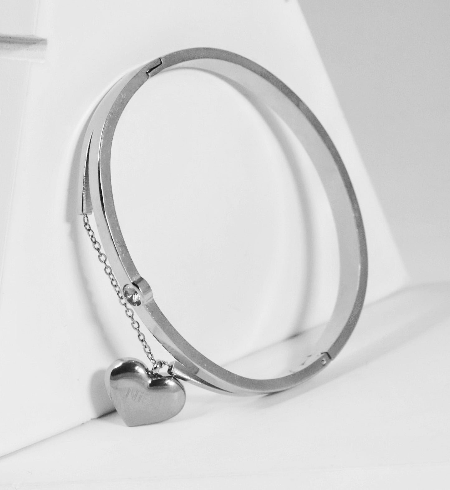 P-Nisa Premium Silver Polish Hanging-Heart Design With Diamond Studded Bracelet For Women and Girls